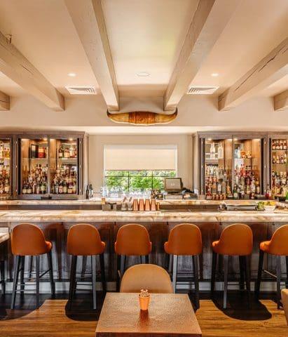 Cattlemen's Lounge at Paso Robles Inn offers a refined yet relaxed atmosphere, perfect for savoring handcrafted cocktails, local wines, and regional spirits. With its warm wood interiors and inviting bar, it captures the spirit of Paso Robles dining culture, blending sophistication and local tradition. Whether you're enjoying a glass of Central Coast wine or an expertly mixed drink, this iconic lounge embodies the art of wine country hospitality.