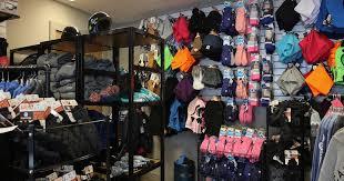 Winter gear and apparel shop at Camelback Resort in the Poconos, offering ski jackets, gloves, hats, and snow accessories for guests preparing for a day on the slopes or snow tubing adventure.