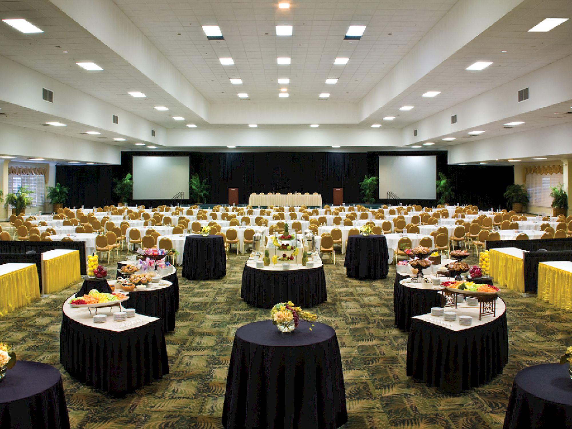 Plan your culinary adventure at Saddlebrook Resort today with beautifully arranged banquet and dining setups in the Grand Pavilion, perfect for conferences, meetings, and elegant catered events.