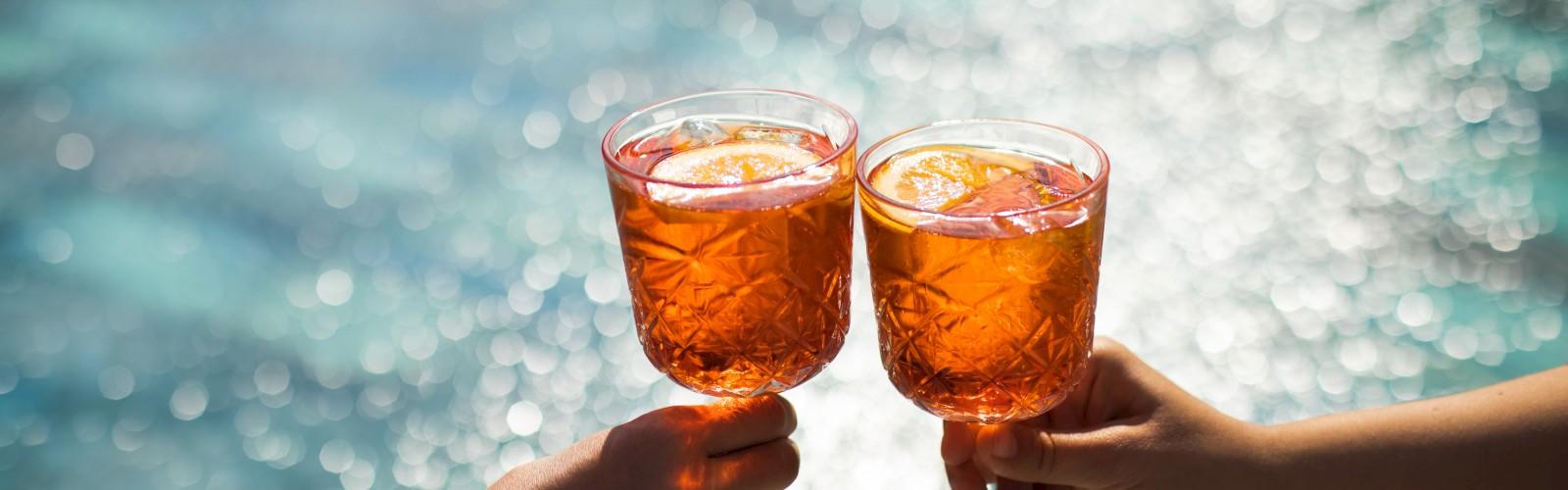 Elegant cocktails raised in a toast at Dempsey’s Too — experience award-winning fine dining in Wesley Chapel with a sophisticated ambiance perfect for memorable occasions.